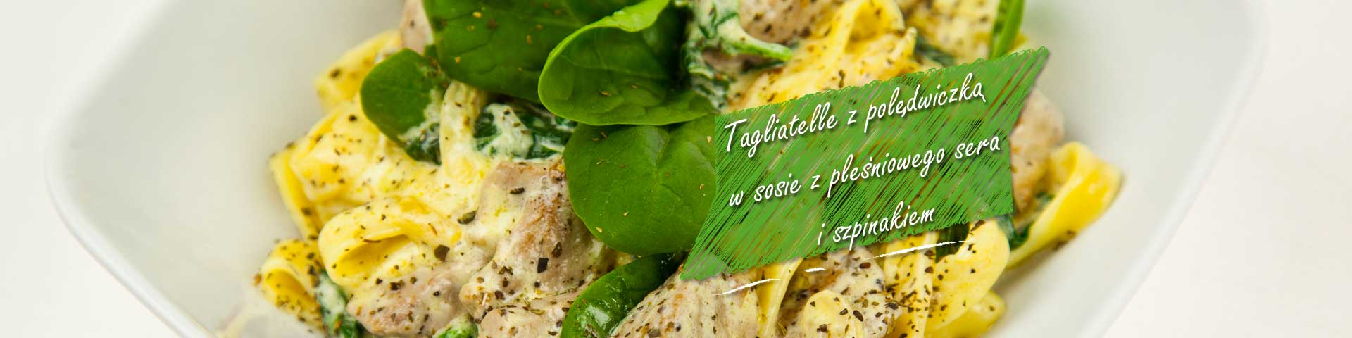 Tagliatelle with pork loin and spinach in a blue cheese sauce